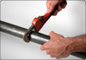 Drain Cleaning and plumbing employee working